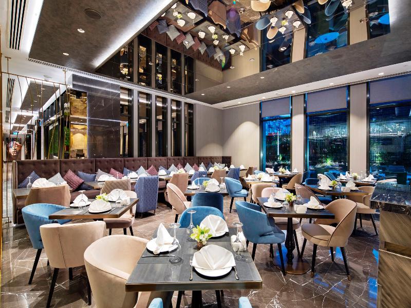 Doubletree By Hilton Istanbul - Piyalepasa Hotel Kültér fotó The interior of the restaurant